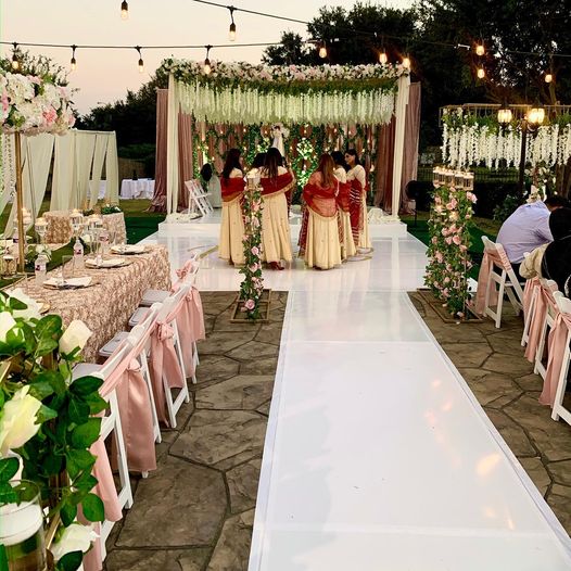 May be an image of 4 people, cake, flower and outdoors